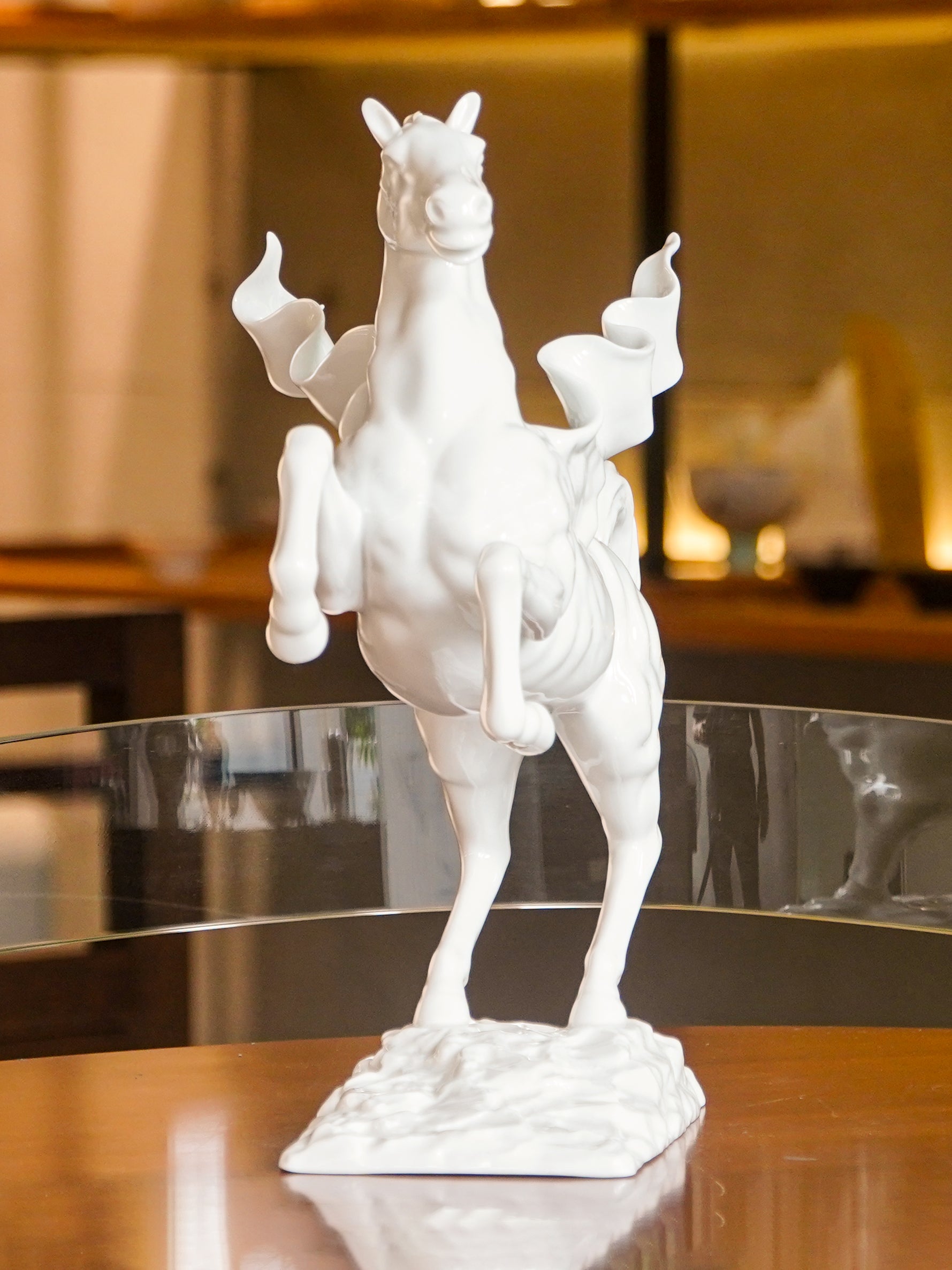Fusion of Eastern dragon-horse and Western Pegasus in dynamic porcelain form